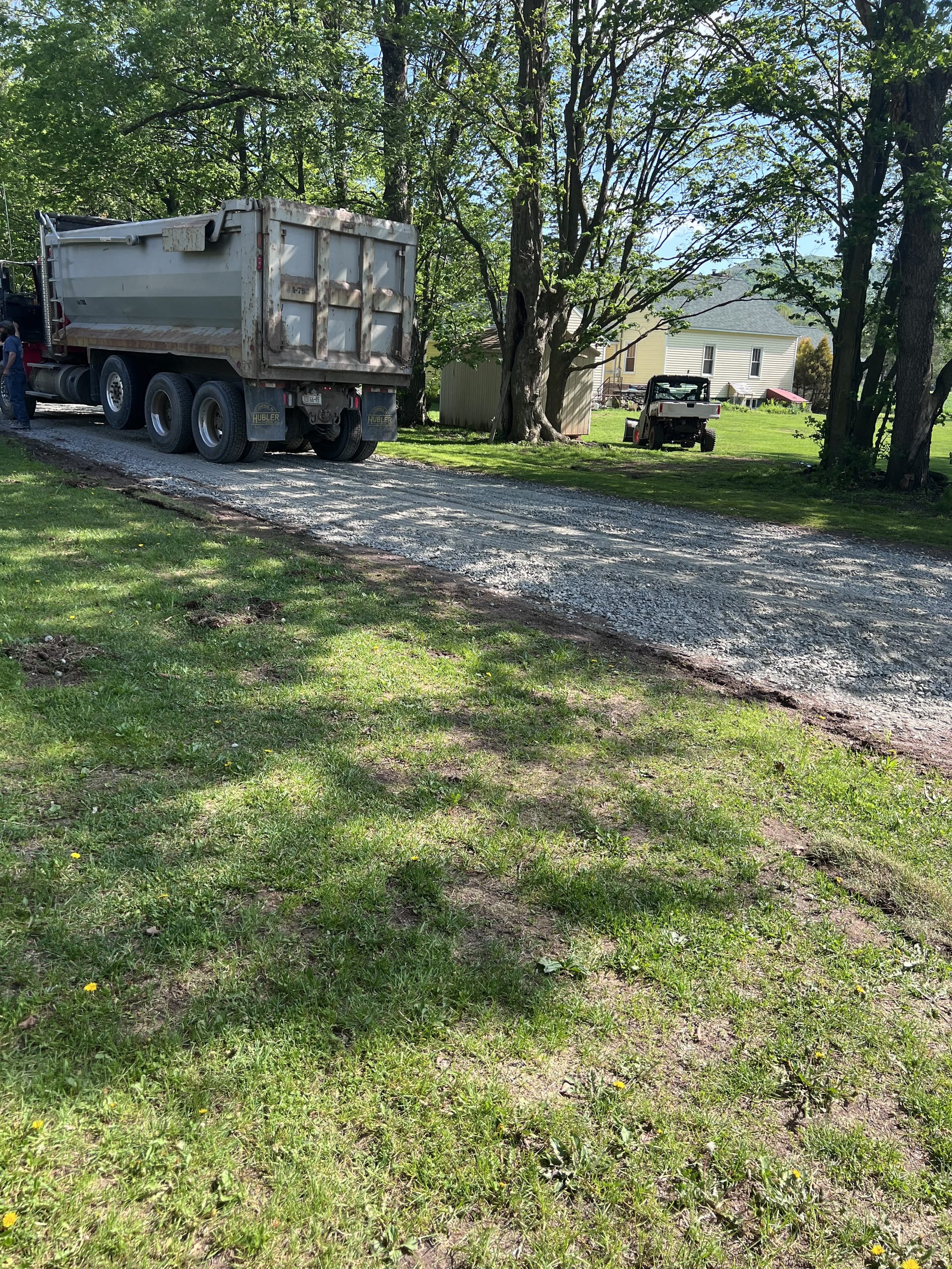 Ashridge Estate farm driveway — gravel hardstand and outbuildings for production vehicle access, South Kortright, New York