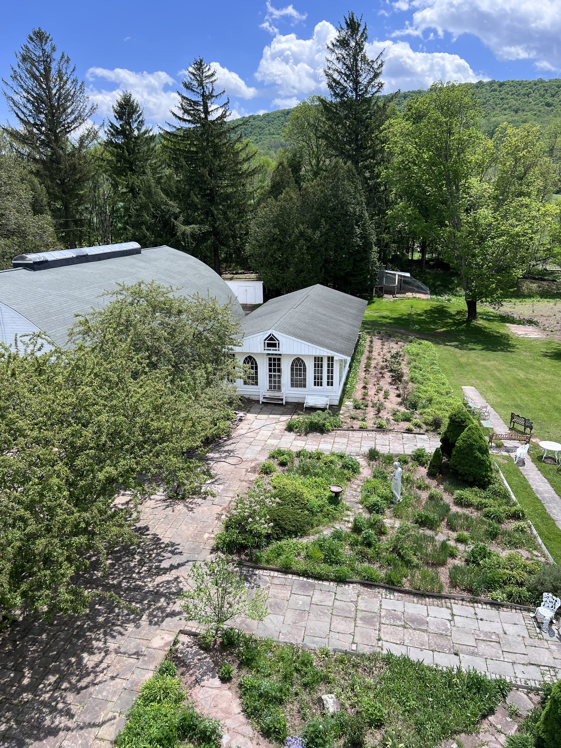Ashridge Italian garden — aerial view of formal beds, stone paths, and conservatory wing, South Kortright, New York