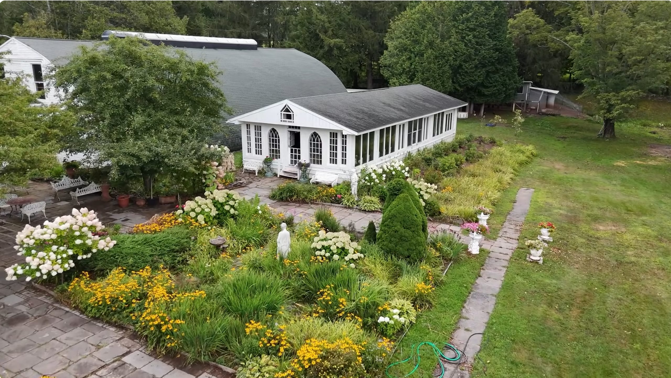 Ashridge Italian garden — elevated view of the conservatory, reflecting pool, and statuary lawns