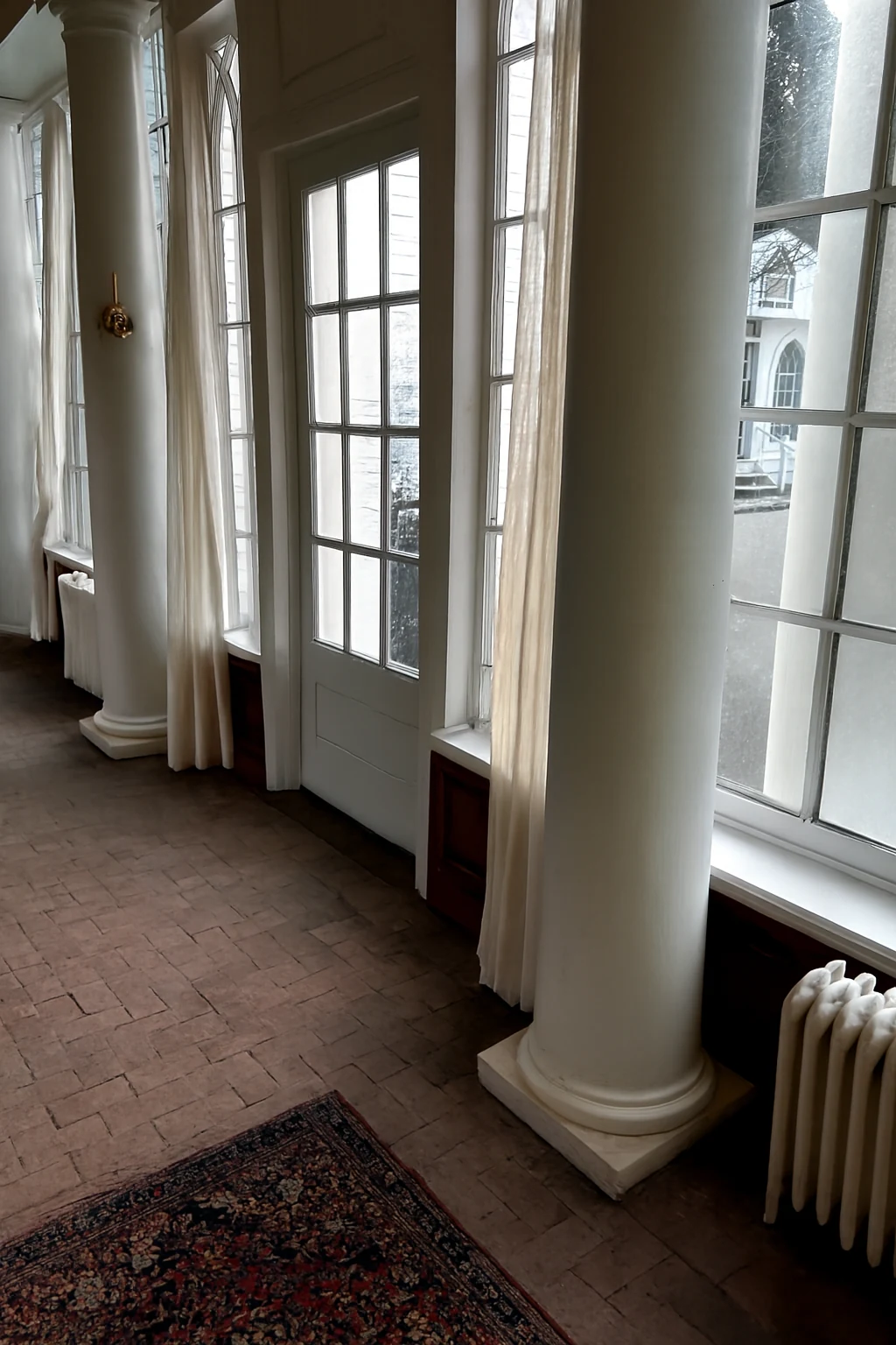 Ashridge conservatory — cleared interior window wall with Gothic glazing and garden light