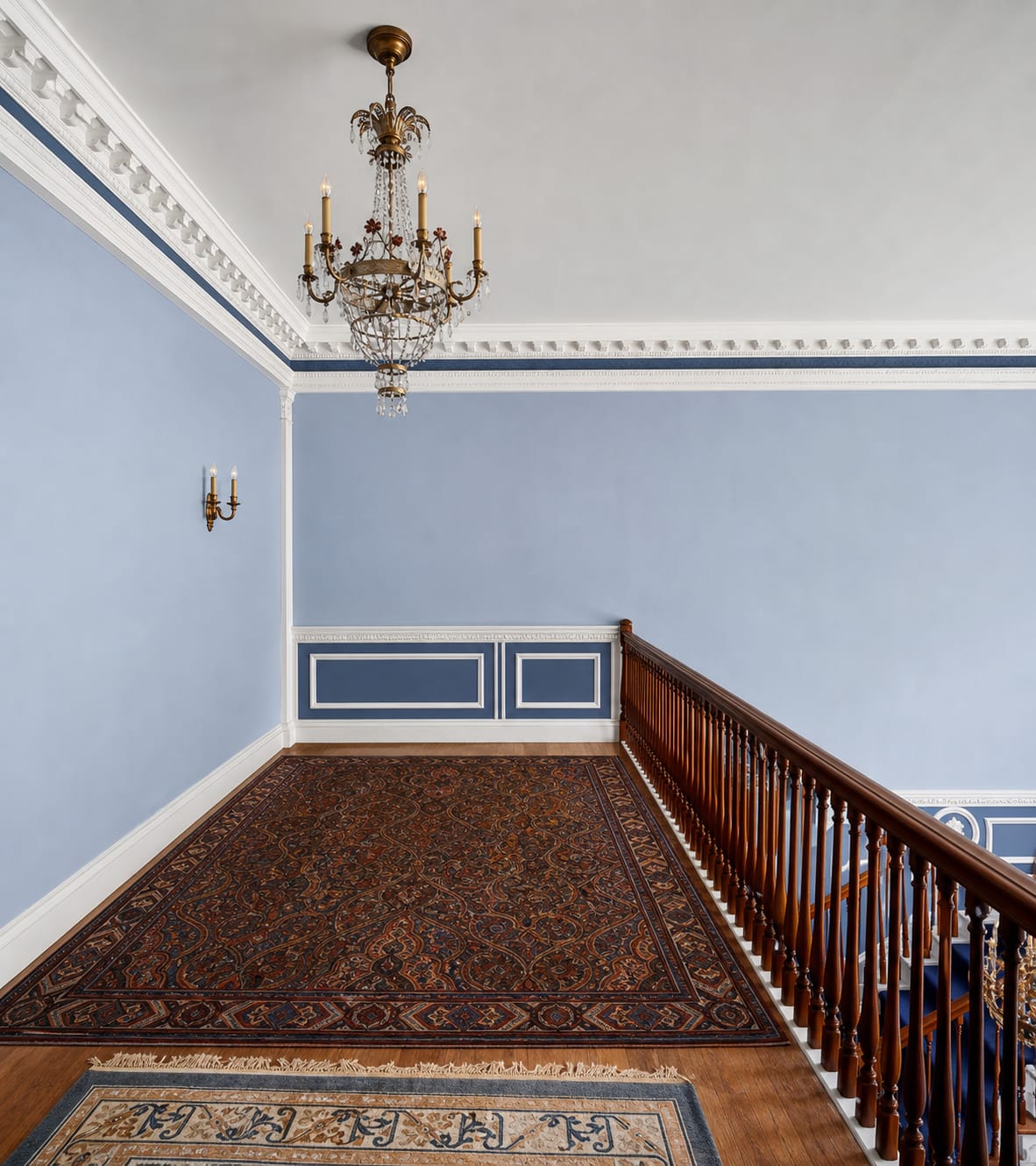 Ashridge mansion upper landing — period balustrade overlooking the main stairwell, powder blue walls