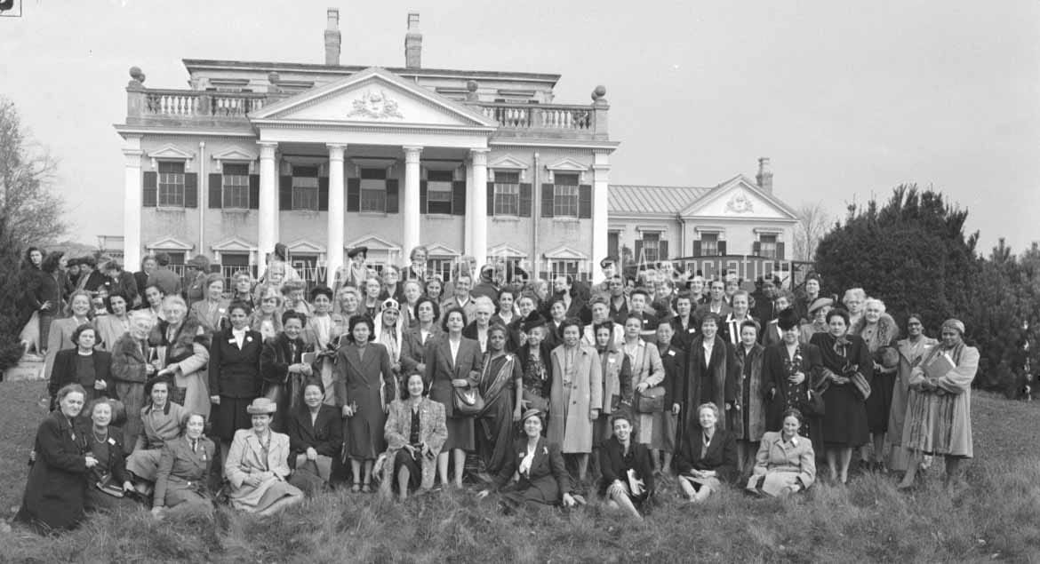The delegates of the International Assembly of Women gathered on the front lawn of Ashridge, October 20, 1946.